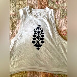 Free People Movement tank. EUC reflective logo on front and back